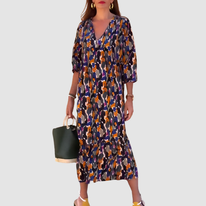 V-neck midi dress, navy multicolor abstract print, gathered skirt and 3/4 sleeves