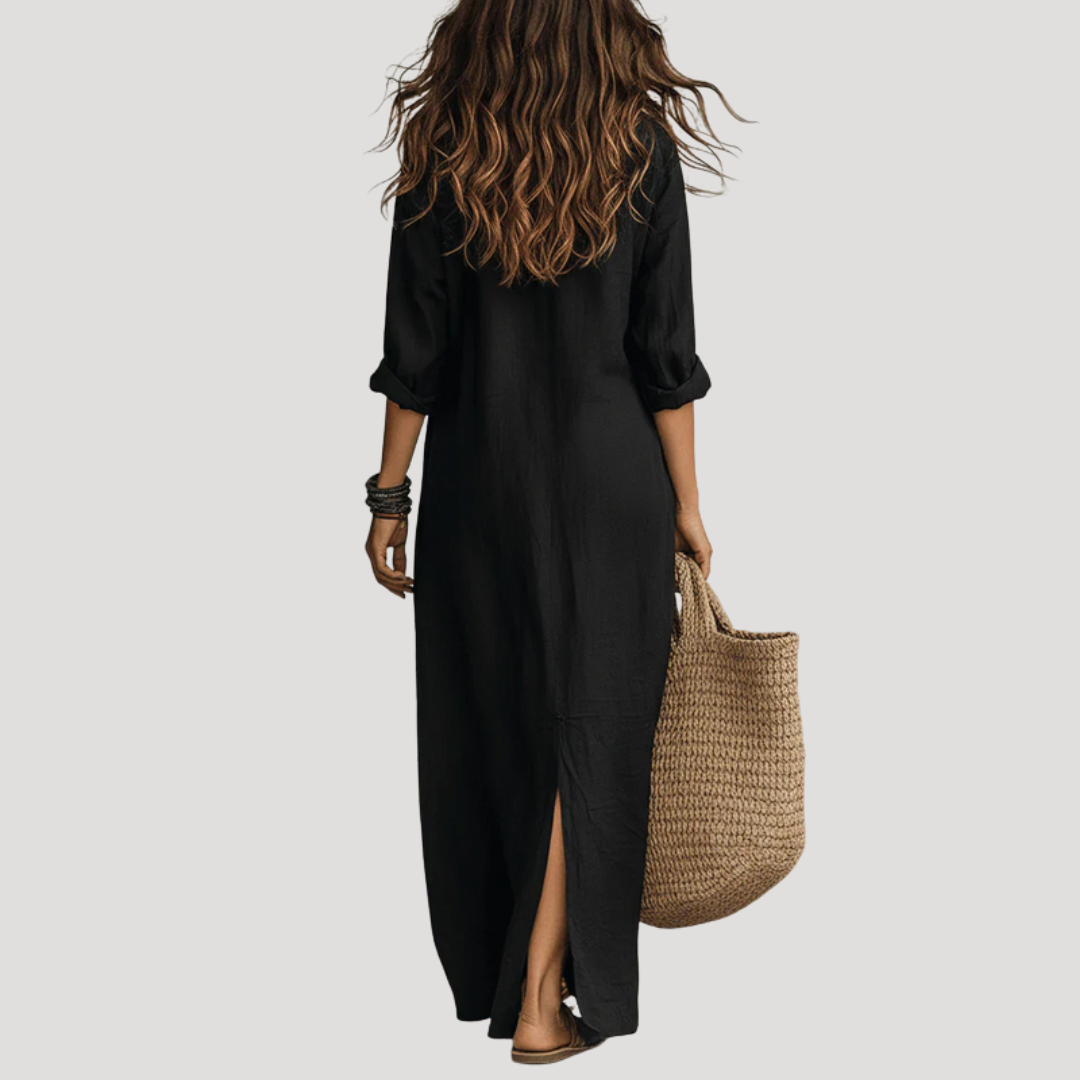 Black maxi shirt dress, back view with three-quarter sleeves and side slit