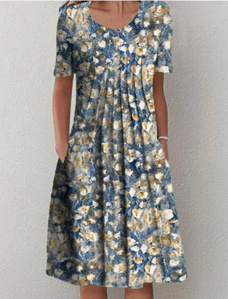 Coverage dress, blue base with yellow and white flower pattern, short sleeves