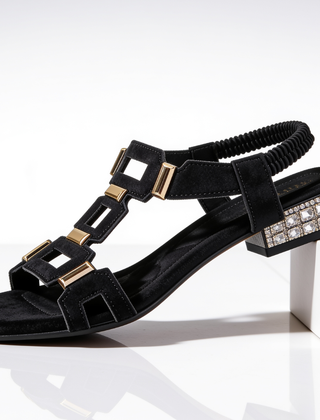 Black strappy heeled sandals with jeweled block heel and adjustable ankle strap