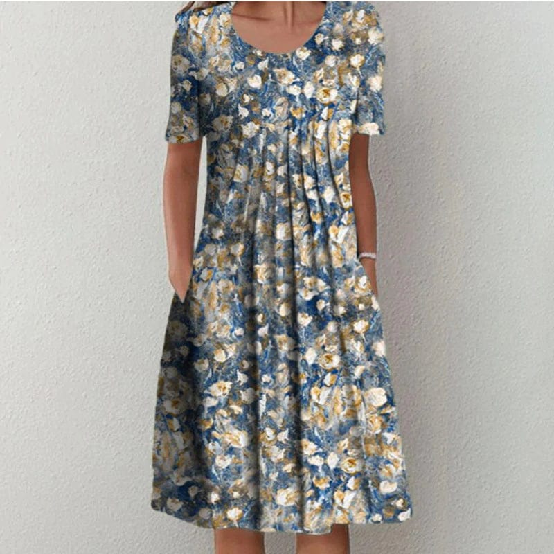 Blue floral dress with scoop neck, short sleeves, ruched tiered skirt