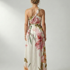 Floral halter backless maxi dress; cream base with pink and green leaf print
