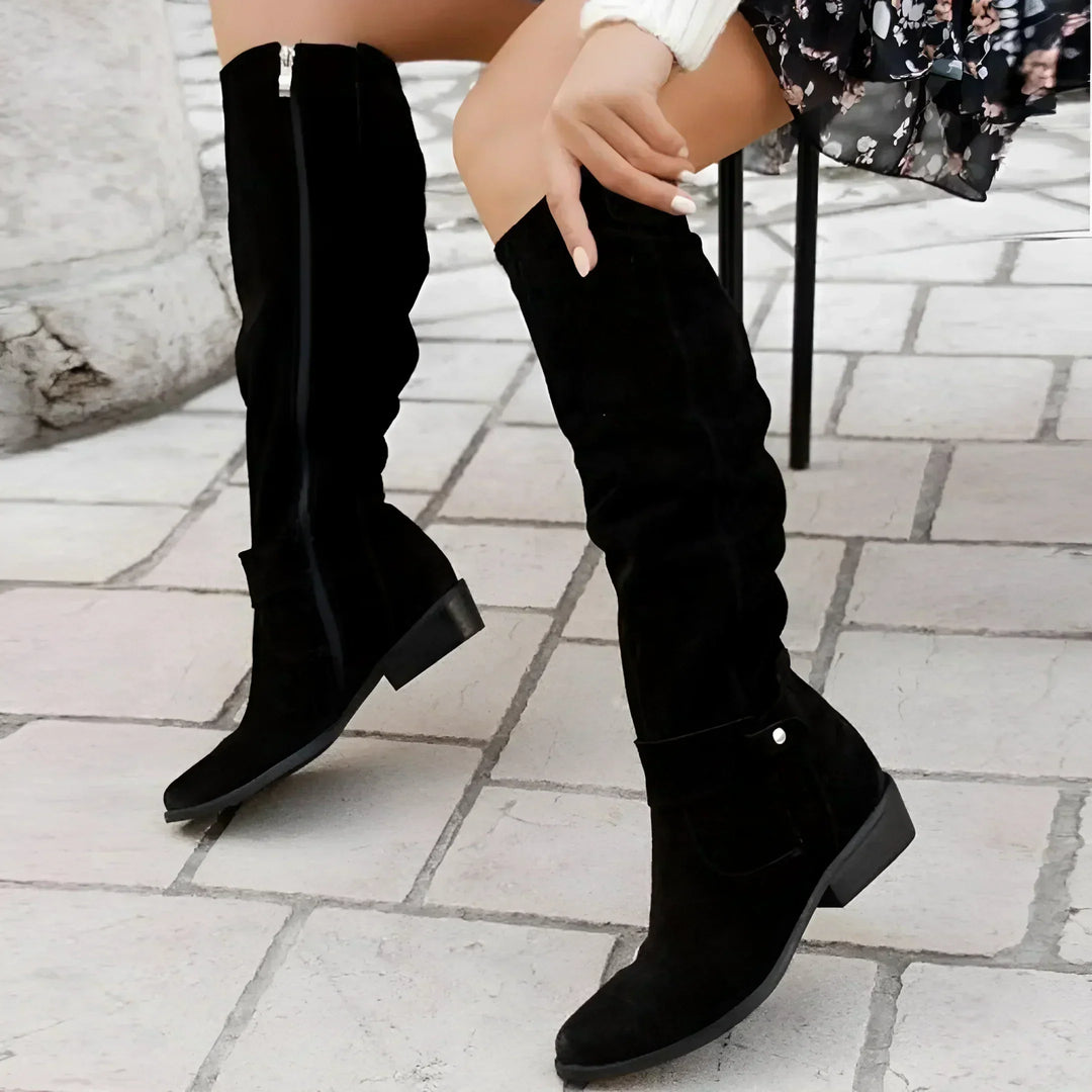 Women's black suede knee-high boots with stacked heel and pull-on fit