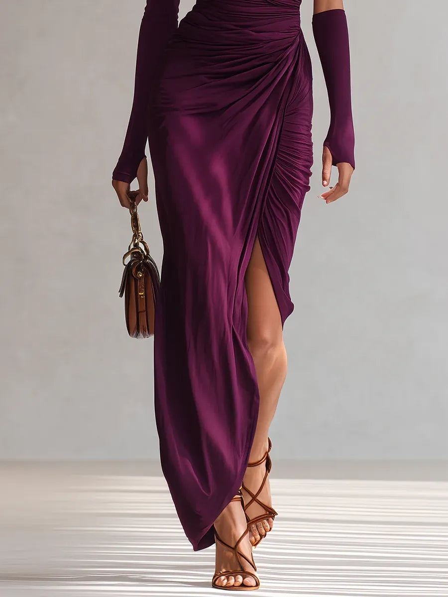 Plum draped maxi dress with one-shoulder neckline, thigh-high slit, long sleeve
