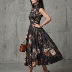 Black floral sleeveless midi dress with high-neck keyhole and pleated skirt