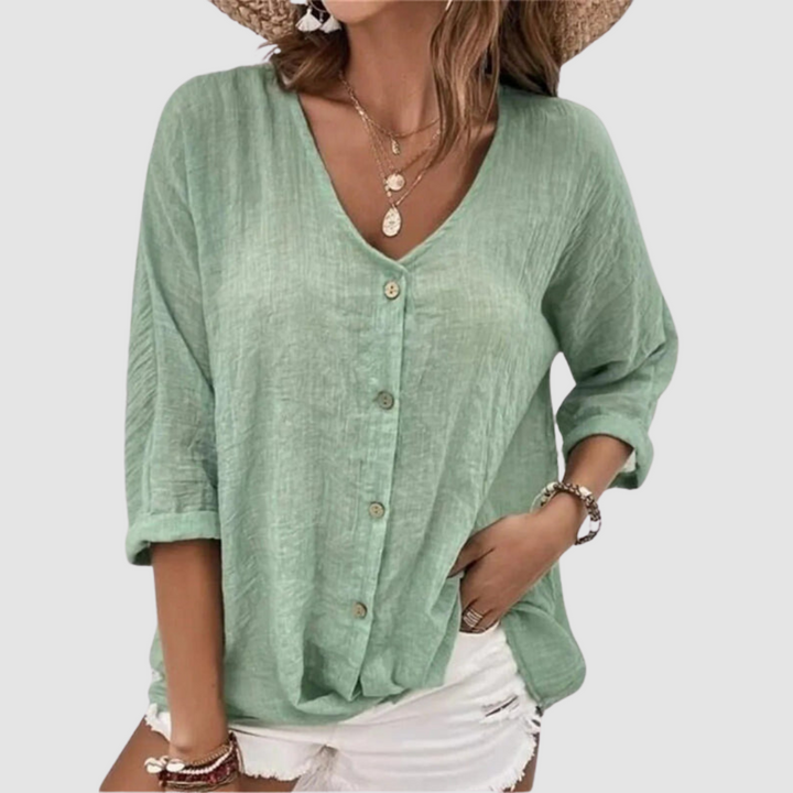 Green button-front breathable blouse with V-neck and three-quarter sleeves