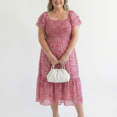 Pink floral off-shoulder smocked midi dress with short puff sleeves and gathered tiers