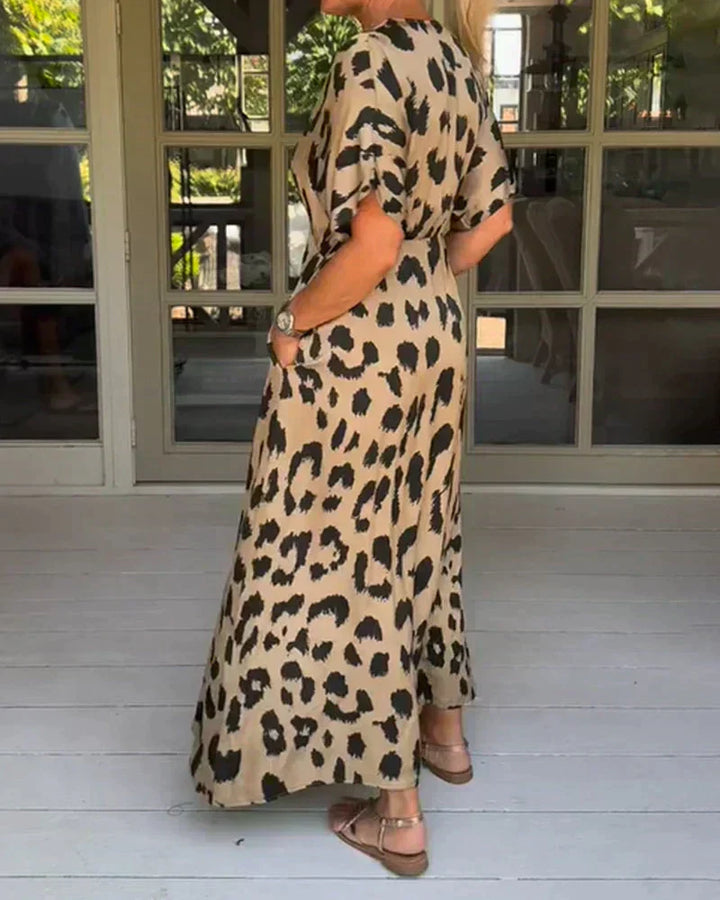 Leopard print maxi dress, V-neck and short sleeves, side view, khaki/black spots