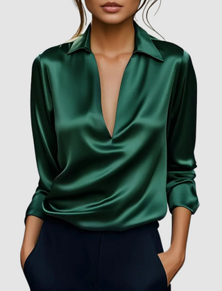 Green satin blouse with collared neckline, deep V, and 3/4 roll-tab sleeves