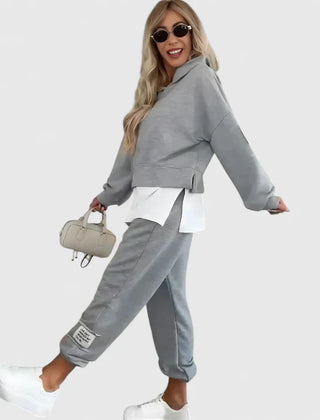 Gray hooded sweatshirt and jogger set with white layered underpiece