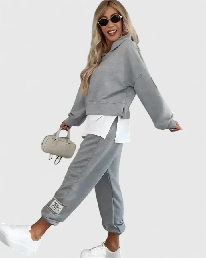 Gray hooded sweatshirt and jogger set with white layered underpiece