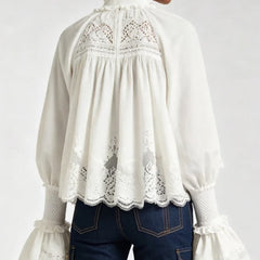 Vivienne blouse in white back view with smocked yoke and lace-trimmed ruffles