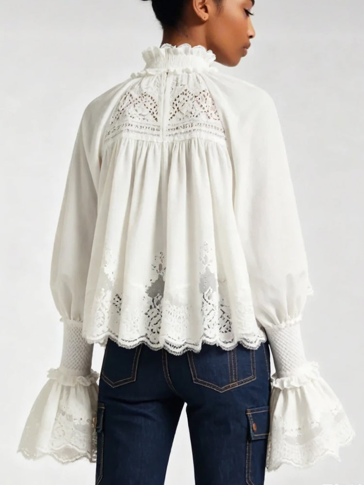 Vivienne blouse in white back view with smocked yoke and lace-trimmed ruffles