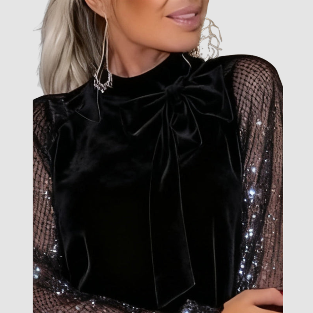 Black velvet dress with bow neckline and sequined mesh long sleeves