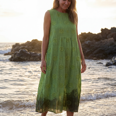 Green sleeveless midi dress with small floral embroidery and tiered hem