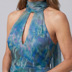 Close-up of blue printed halter maxi dress with keyhole neckline
