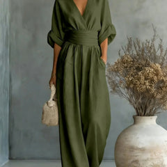 Women’s wide-leg jumpsuit in olive green with V-neck and loose gathered waist