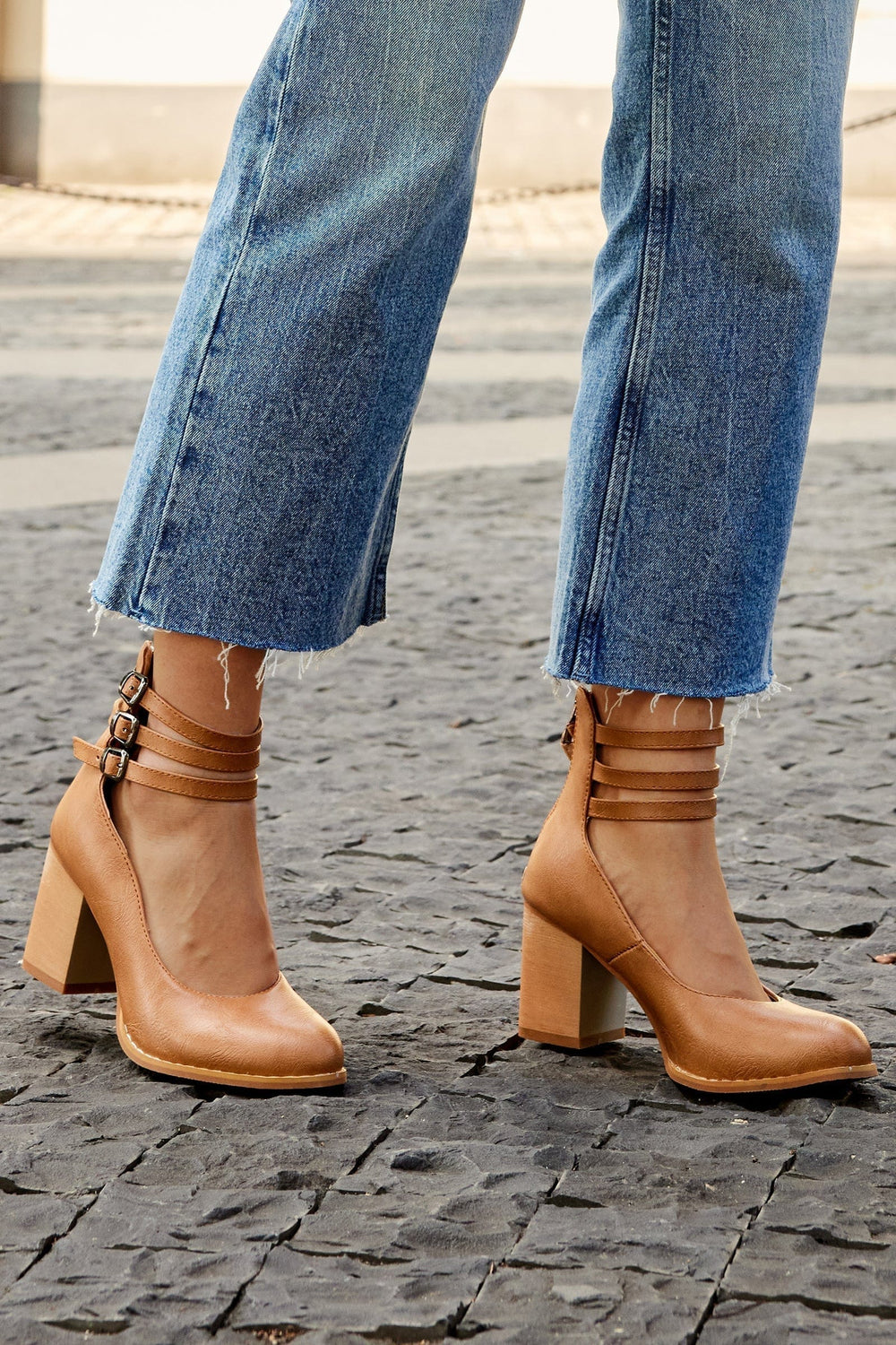 Kallie triple buckle block heels in tan with three straps and side buckles