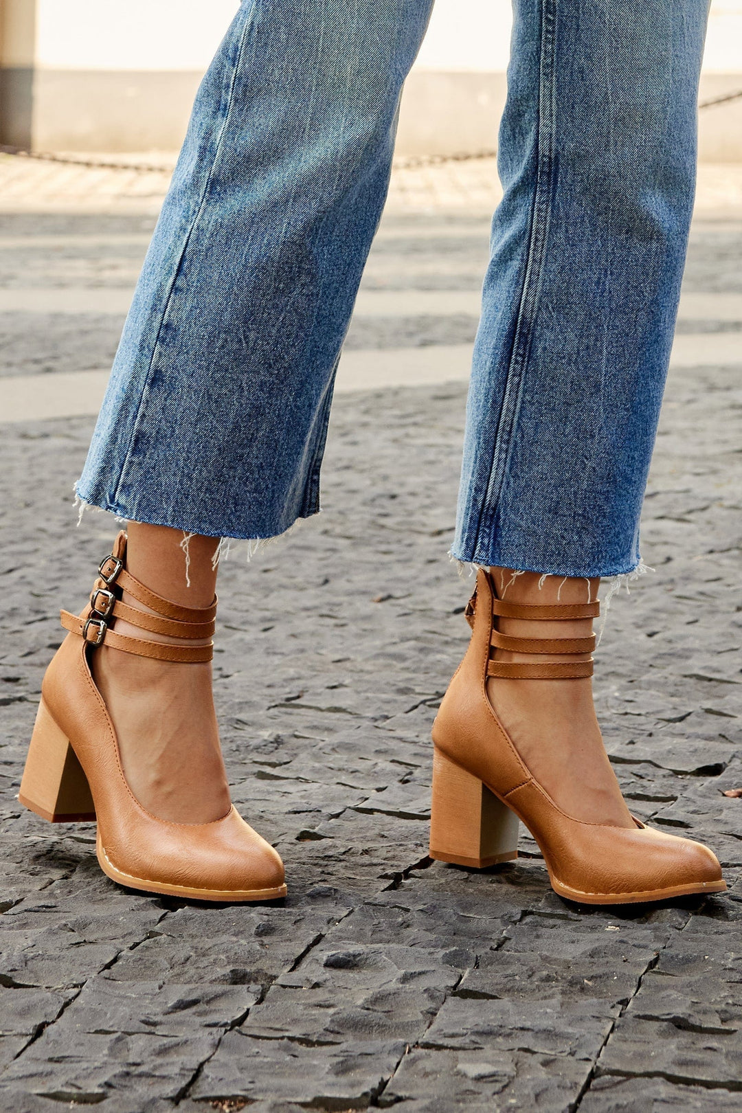 Kallie triple buckle block heels in tan with three straps and side buckles