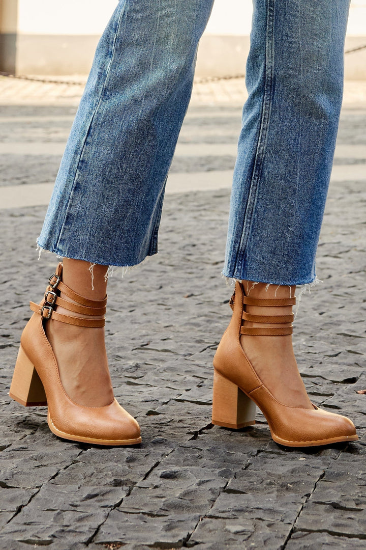 Kallie triple buckle block heels in tan with three straps and side buckles