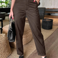 Sleek tailored pants in dark brown pinstripe, tailored straight leg, belt loops, cuffed hem
