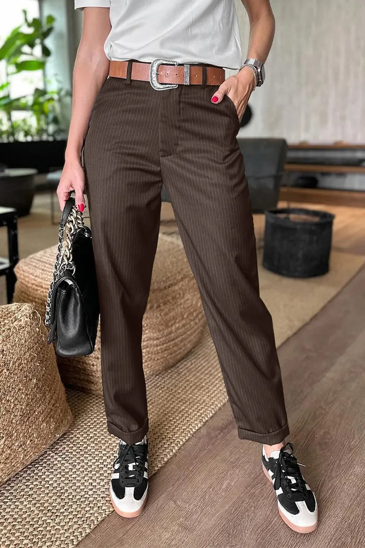 Sleek tailored pants in dark brown pinstripe, tailored straight leg, belt loops, cuffed hem
