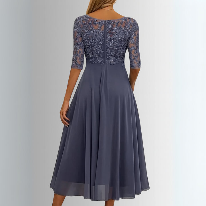 Navy lace-back midi dress with 3/4 sleeves and pleated skirt