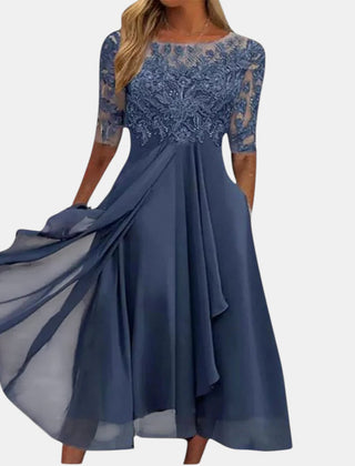 Navy blue elegant dress with lace top, 3/4 sleeves, and pleated full skirt