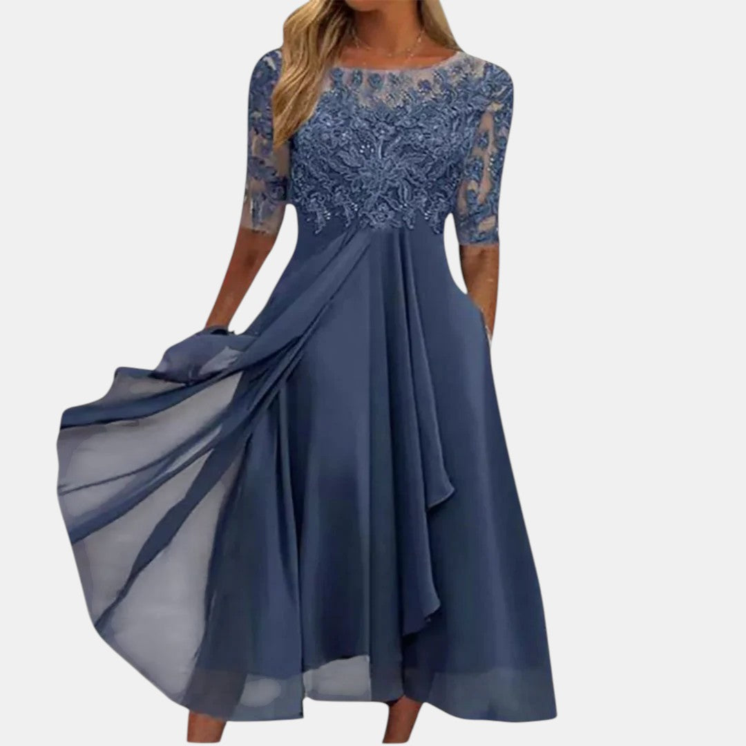 Navy blue elegant dress with lace top, 3/4 sleeves, and pleated full skirt