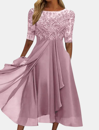 Pink elegant dress with lace bodice, 3/4 sleeves, and flowing pleated A-line skirt