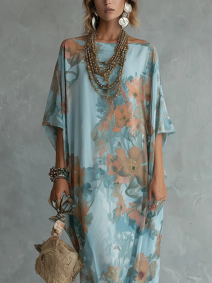 Light blue long floral dress with draped short sleeves and round neckline