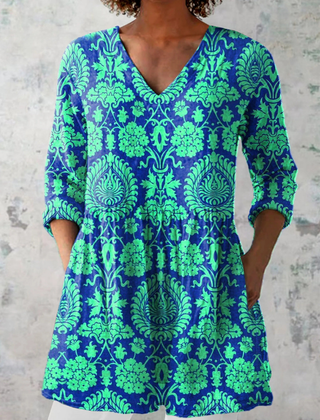 Teal V-neck long blouse with 3/4 sleeves and floral swirl print
