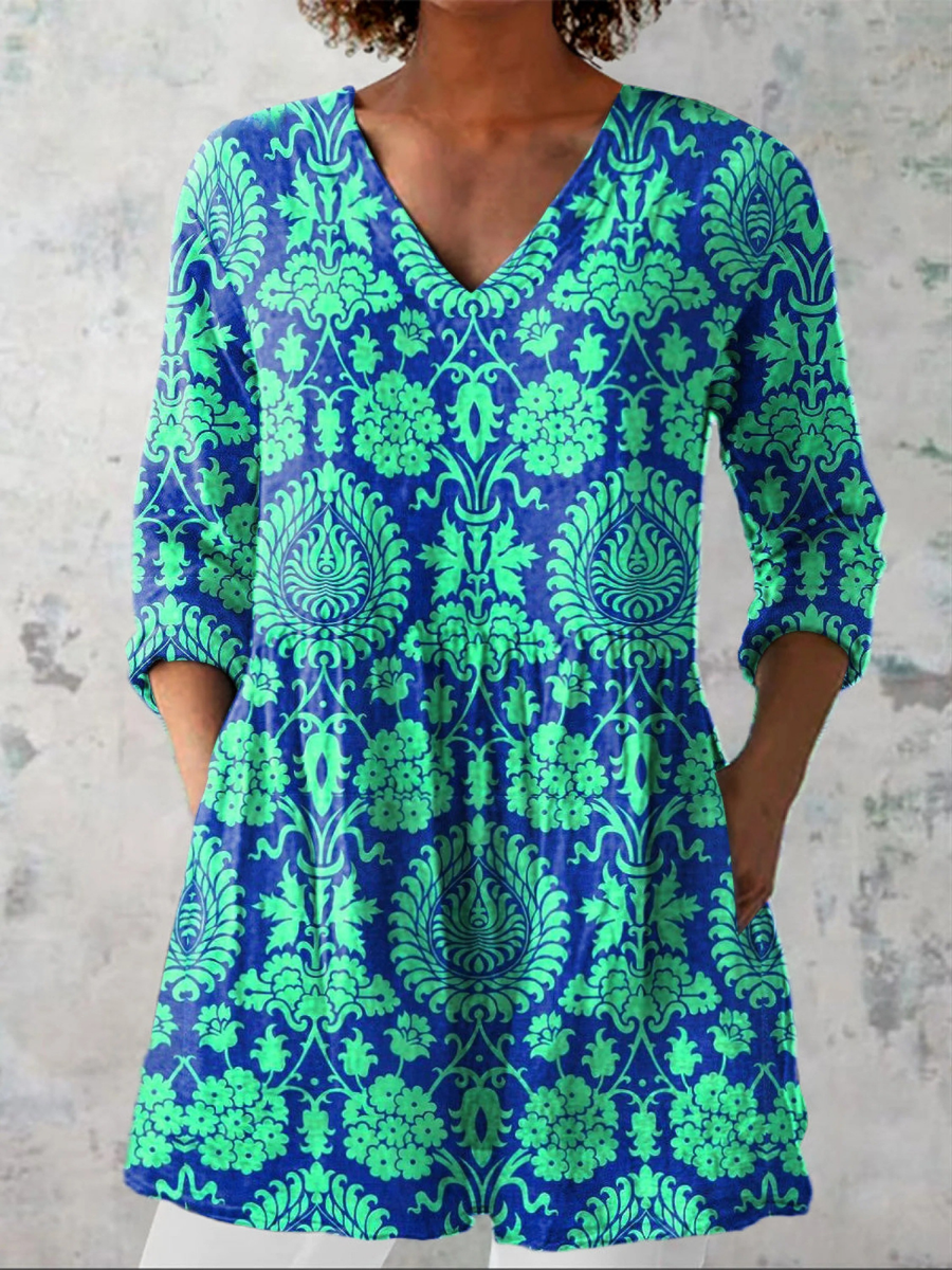 Teal V-neck long blouse with 3/4 sleeves and floral swirl print