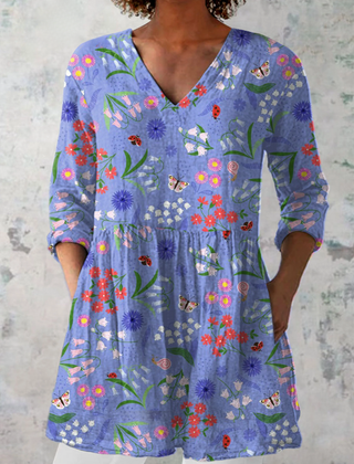 Purple long V-neck blouse with colorful floral and butterfly print, 3/4 sleeves