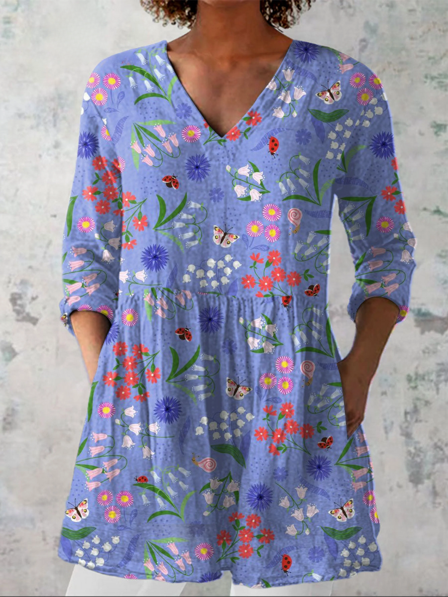 Purple long V-neck blouse with colorful floral and butterfly print, 3/4 sleeves