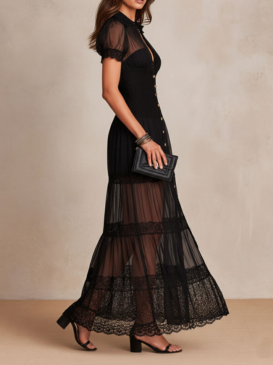 Black maxi dress in sheer tiers with scalloped lace hem, short puff sleeves and button front