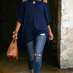 Navy asymmetric cold-shoulder blouse with draped layered hem and short sleeves