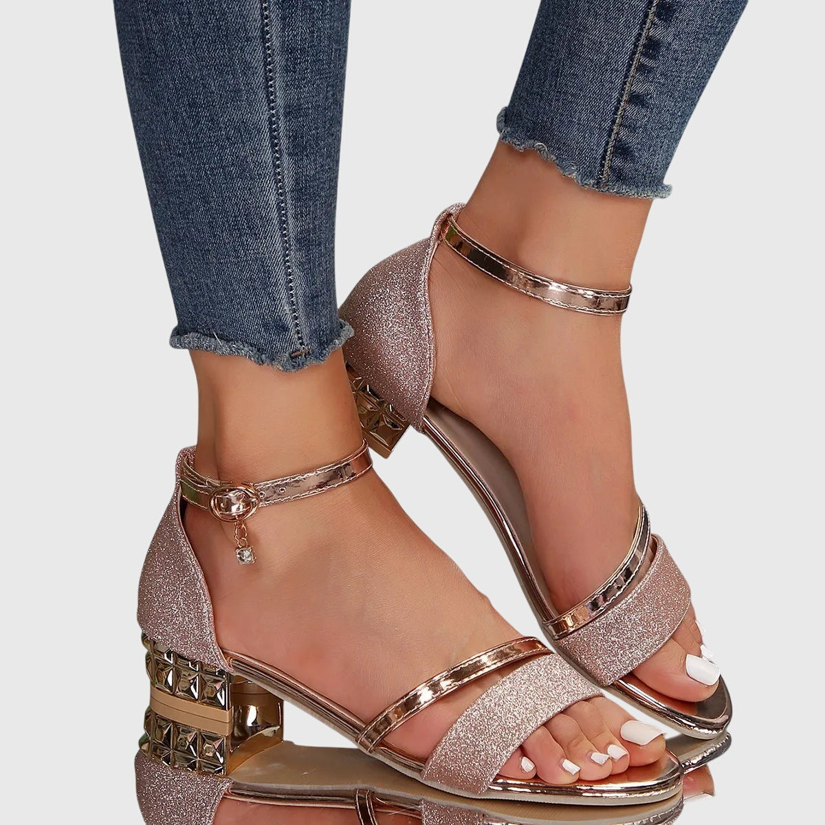 Orthopedic heeled sandals in rose gold glitter with ankle strap, open toe, and gold-tone heel