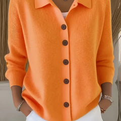 Orange button-front knit cardigan with point collar and dark buttons, long sleeves