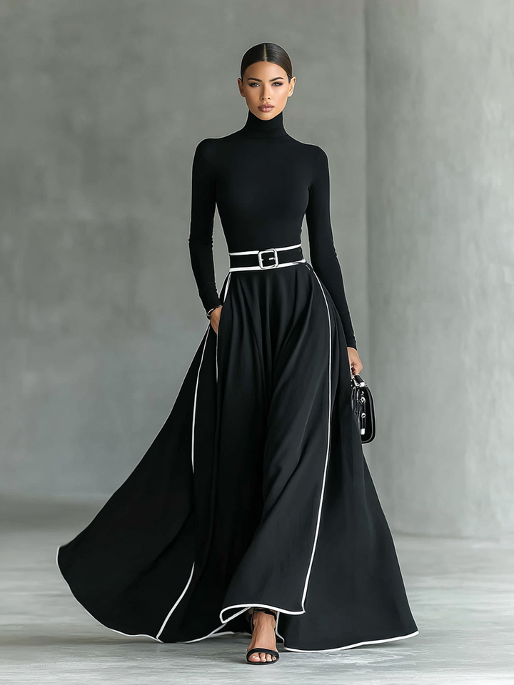 Black long-sleeve maxi dress with built-in belt, flared skirt, high neckline