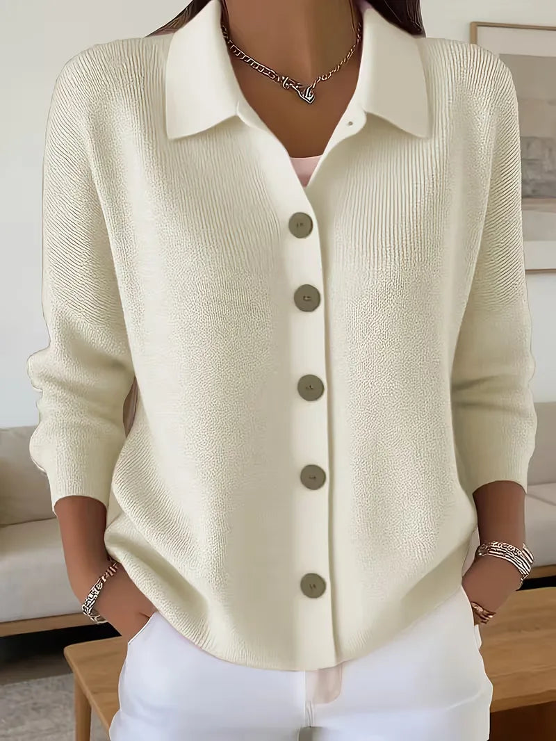 Ivory button-front knit cardigan with point collar and dark buttons, long sleeves