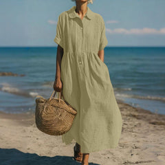 Light sage green collared button dress with short sleeves and gathered waist