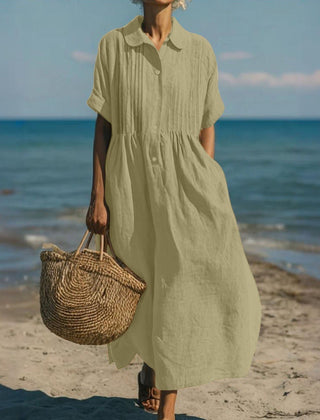 Light sage green collared button dress with short sleeves and gathered waist