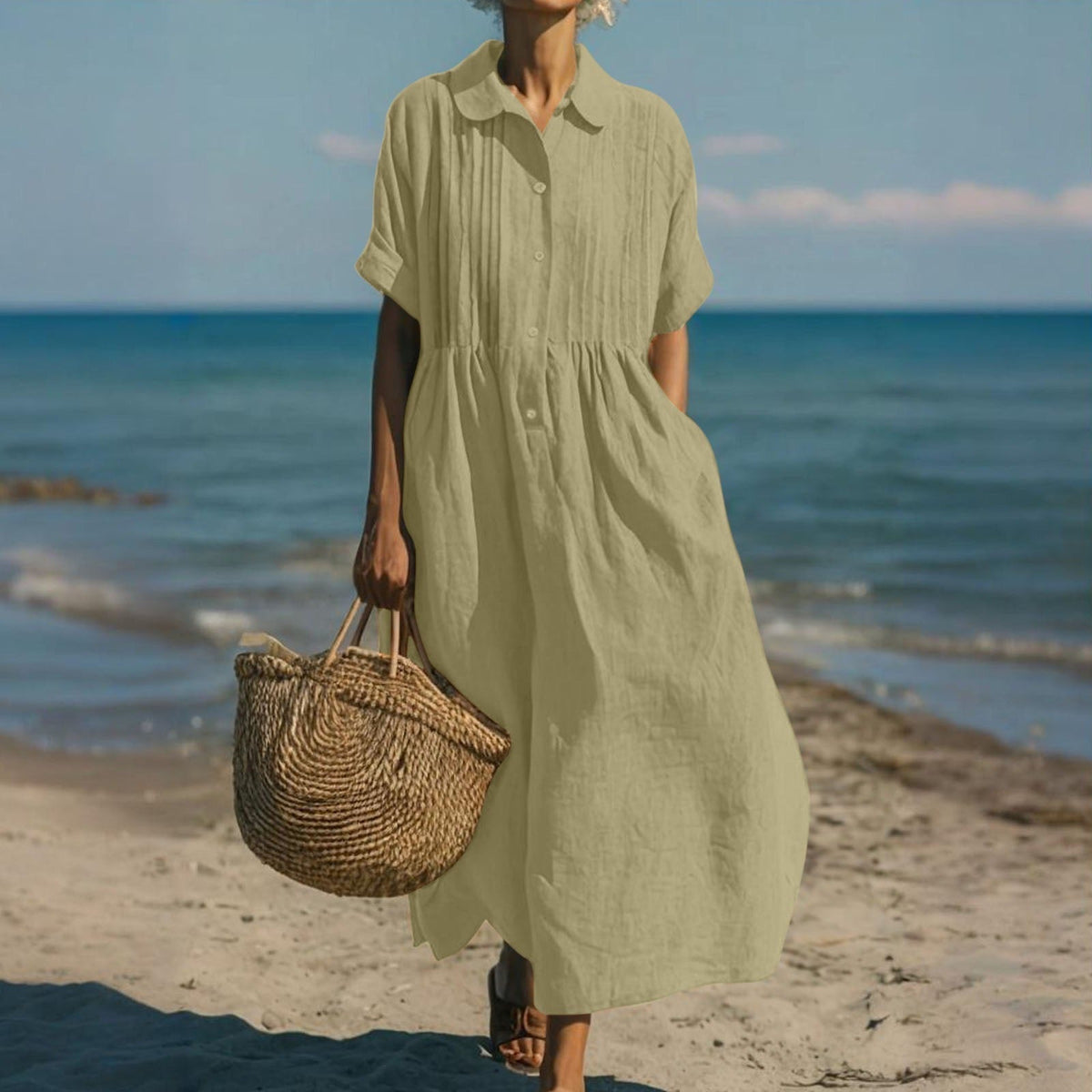 Light sage green collared button dress with short sleeves and gathered waist