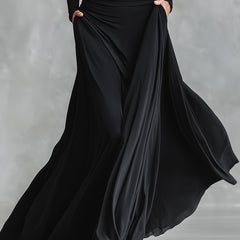 Black maxi dress skirt with gathered drape and flowing flare hem