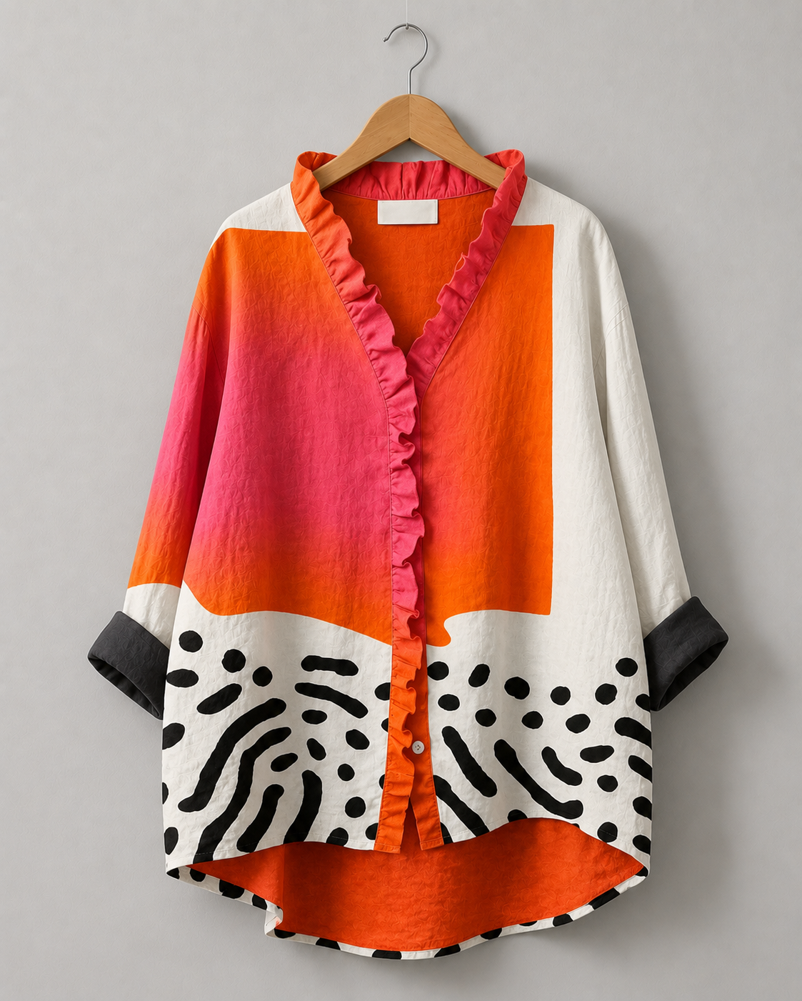 Relaxed tunic on hanger, ruffle button-front with orange and white color-block and zebra print