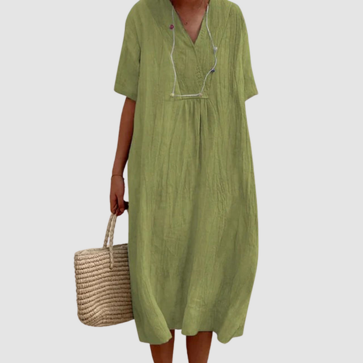 Olive green bohemian dress with V-neck, short sleeves, gathered waist, flowy midi