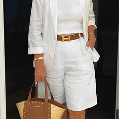 White two-piece suit set with cropped blazer and matching shorts