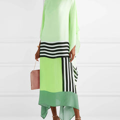 Regan light green kaftan with black-and-white striped border and handkerchief hem