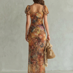 Multicolor ruched midi dress with ruffled puff sleeves and open back, floral print.